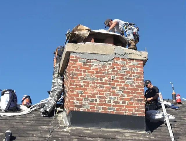 Monrovia Chimney Sweep installing a custom chimney crown in Monrovia, CA