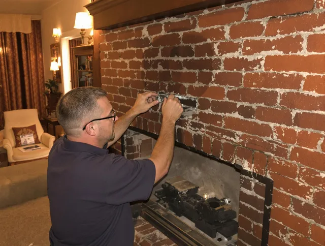 Monrovia Chimney Sweep expert fixing a fireplace in Monrovia, CA